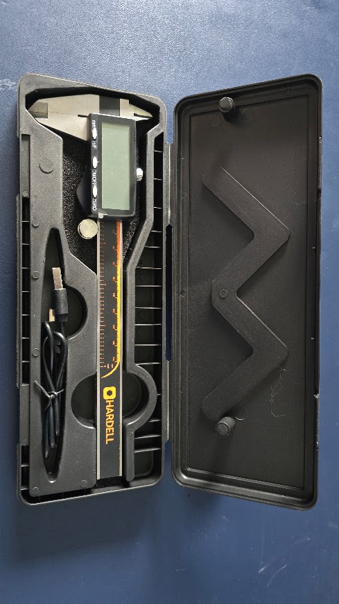 Hordell digital caliper in protective case with calibration shim